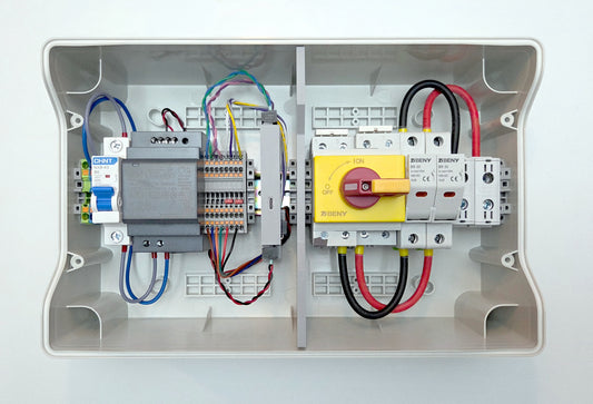 Electrical panel with wiring and components on a white background