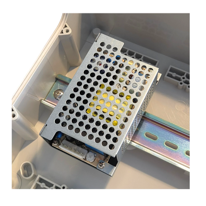 Redispose Meanwell PSC-60A-C 12VDC 2.8A switched power supply unit with UPS function mounted on a DIN rail inside a plastic enclosure.