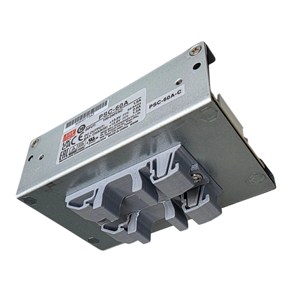 Redispose Meanwell PSC-60A-C 12VDC 2.8A switched power supply unit with UPS function and 3D-printed DIN rail clip.