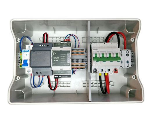 Redispose Stark Box Basic with Stark CMR and MCB, featuring a 4-pole DC circuit breaker, terminal blocks, and wiring in a white enclosure.